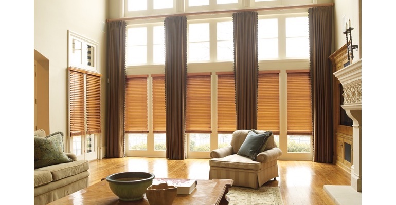 Seattle great room with natural wood blinds and floor to ceiling drapes.